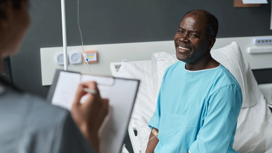Patient talking to nurse during her visit